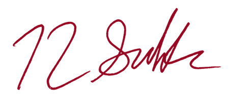 Signature in dark red ink, with the numbers 
