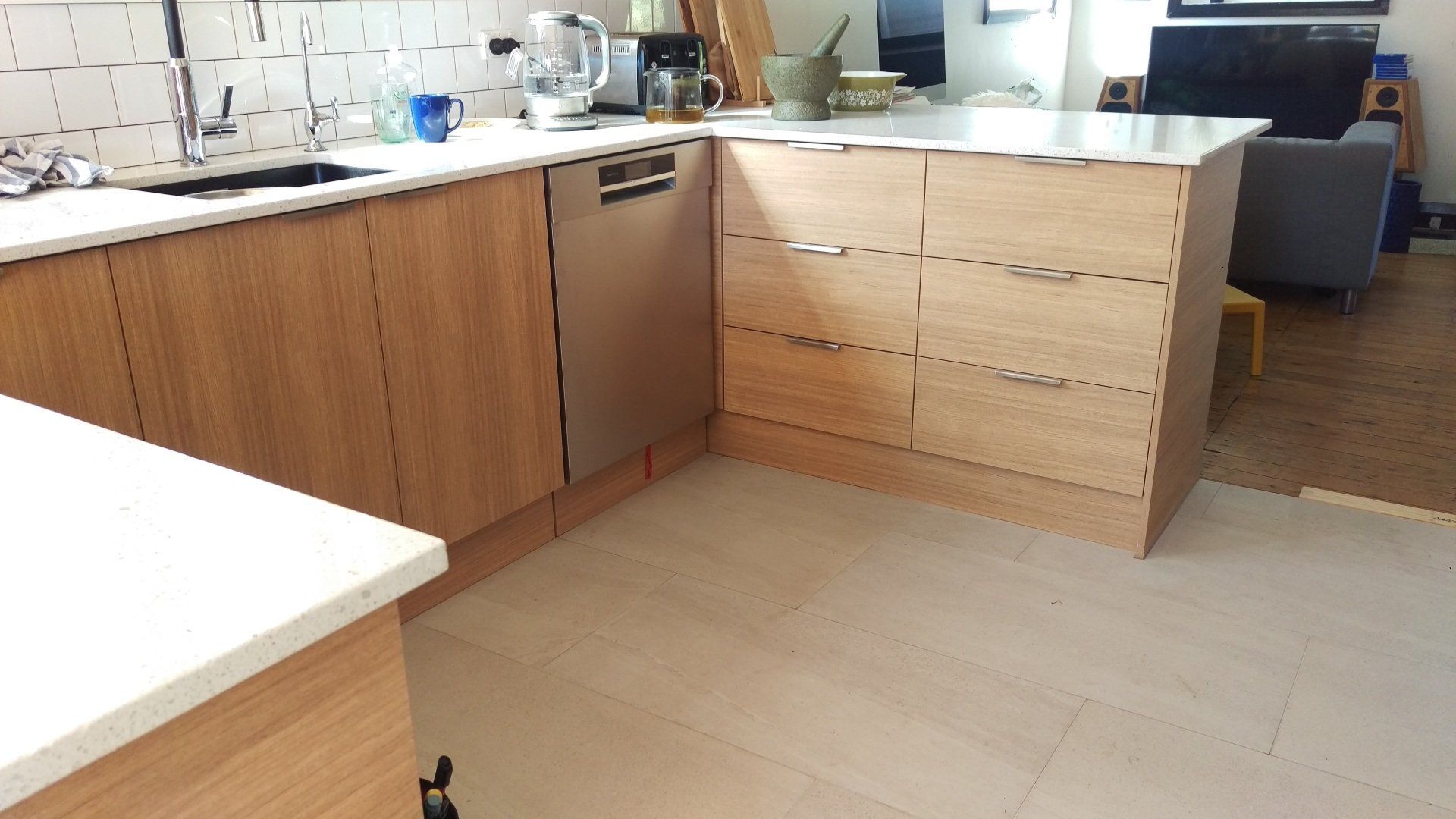 Wood grain look alike doors with a caesar stone top Kitchen in north katoomba blue mountains NSW