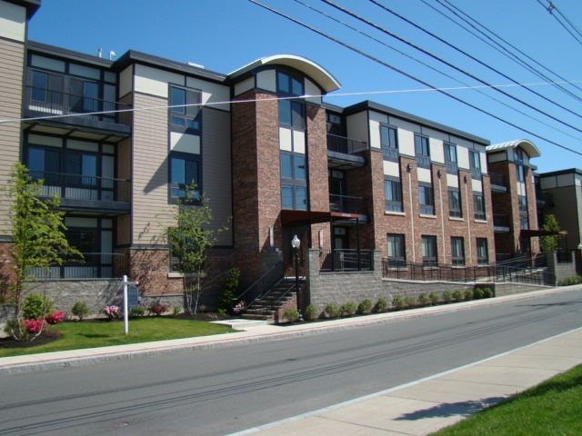 A large brick building with a lot of windows