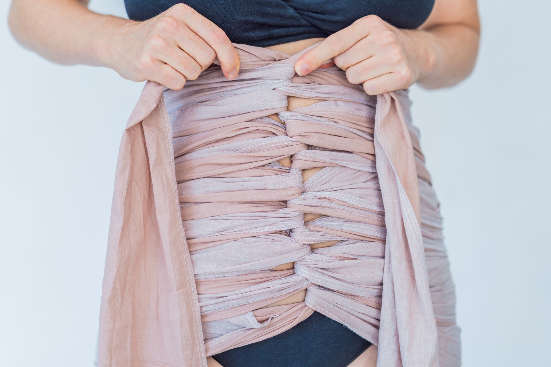 Virtual and in-home breastfeeding support and  postpartum Bengkung belly binding with Lacey ortiz certified birth and postpartum doula in Syracuse and Central New York