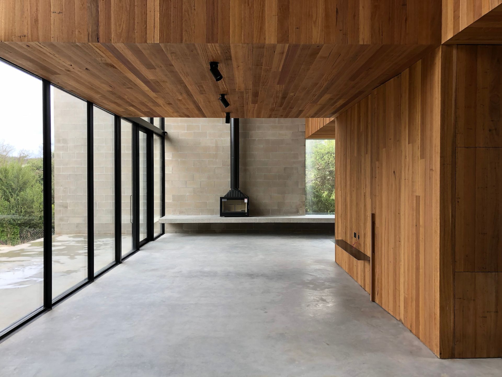Modern Interior With Wood Ceiling and Wall — On The Rise Builders in Maroochydore, QLD