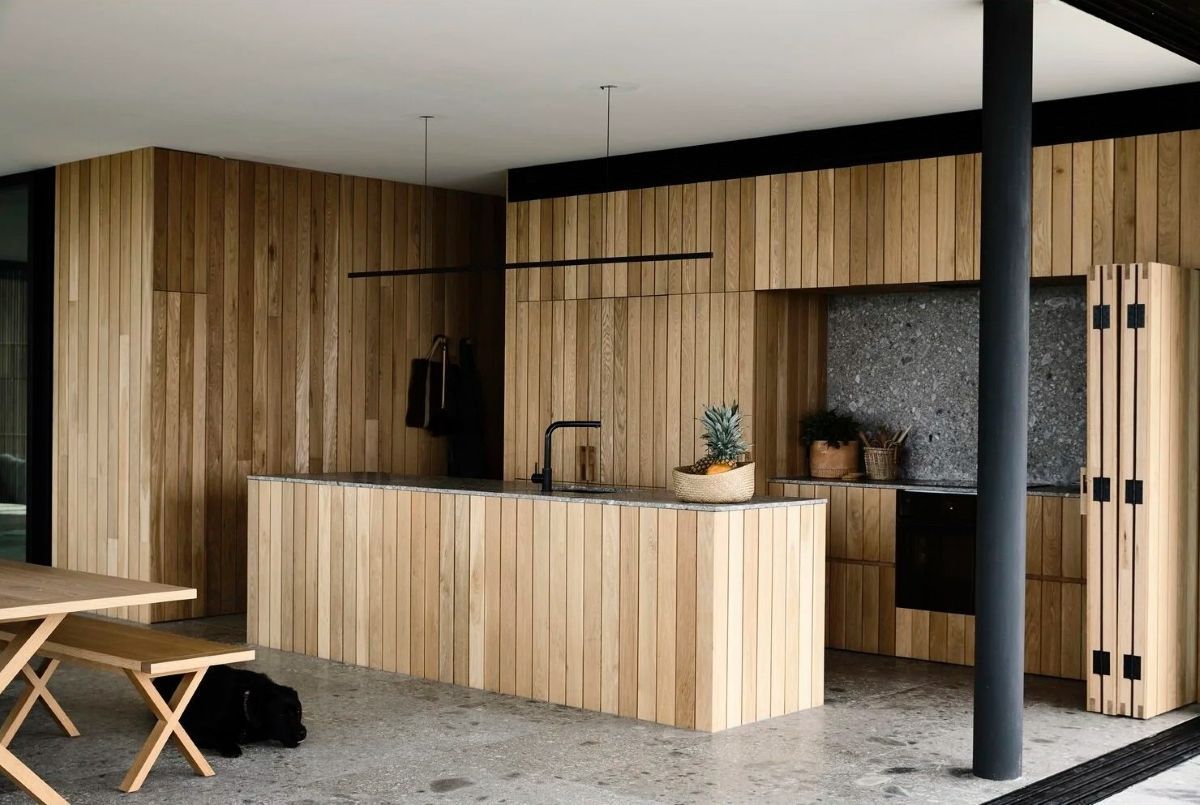 Wooden Kitchen with A Central Island, Black Accents — On The Rise Builders in Noosa, QLD