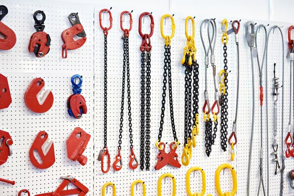 There Are Many Different Types of Hooks and Chains on The Wall —  D & S Crane Hire & Rigging In Noosa, QLD
