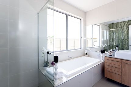 bathroom with white tub