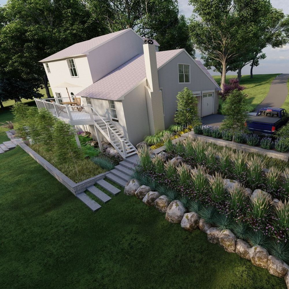 A house with a garden and trees on a sloped residential landscape with terraces. Main Line Landscape Design