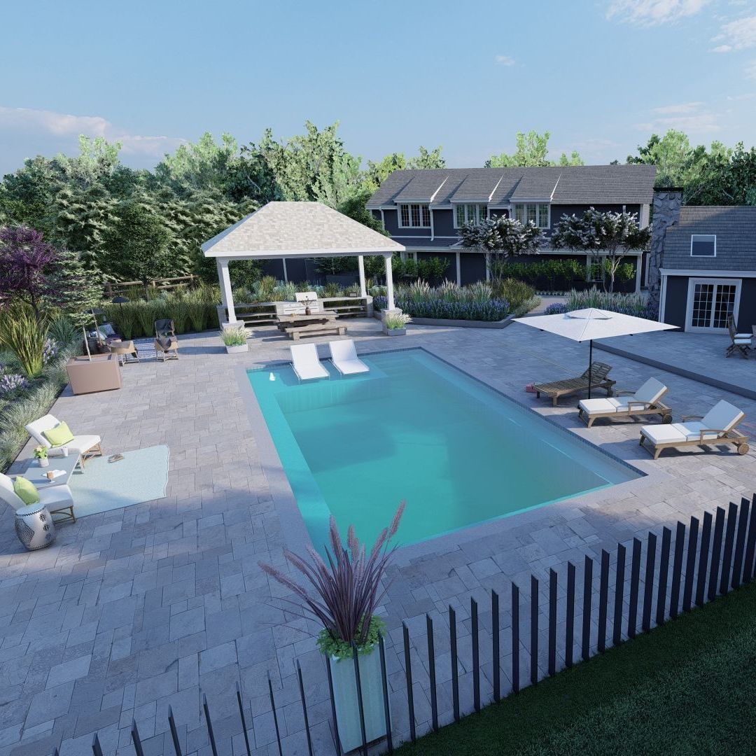 Tranquil backyard oasis featuring a pool and gazebo. Main Line Landscape Design.