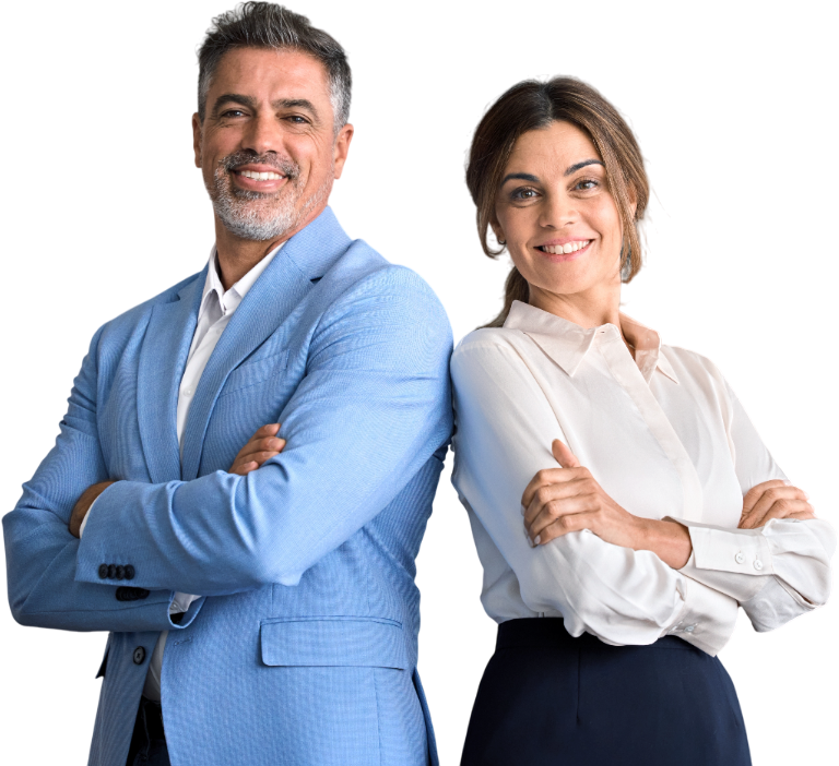 A man and a woman in business attire stand back-to-back, smiling with arms crossed.