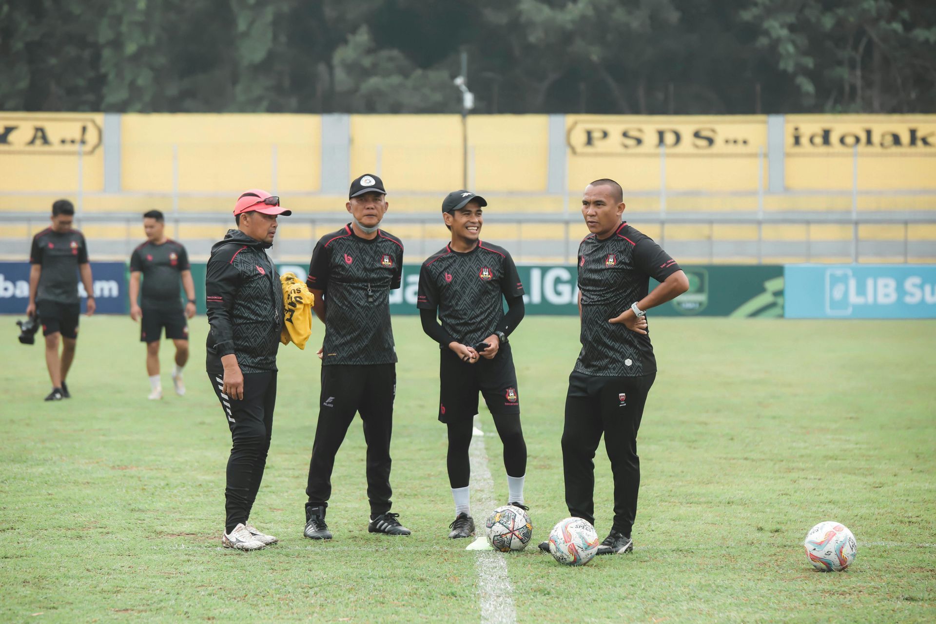 A group photo of coaches.