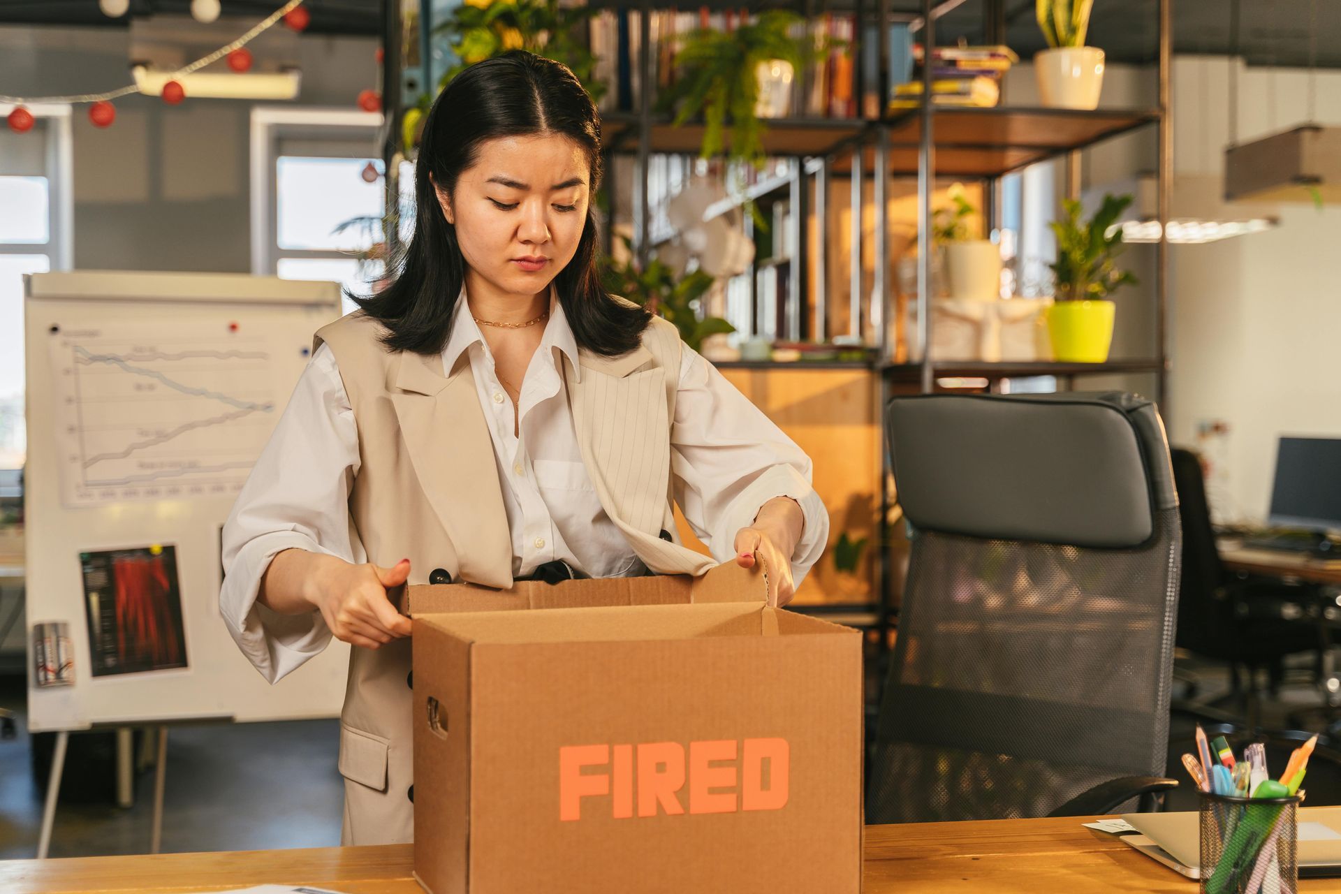 A photo of a woman who is fired.