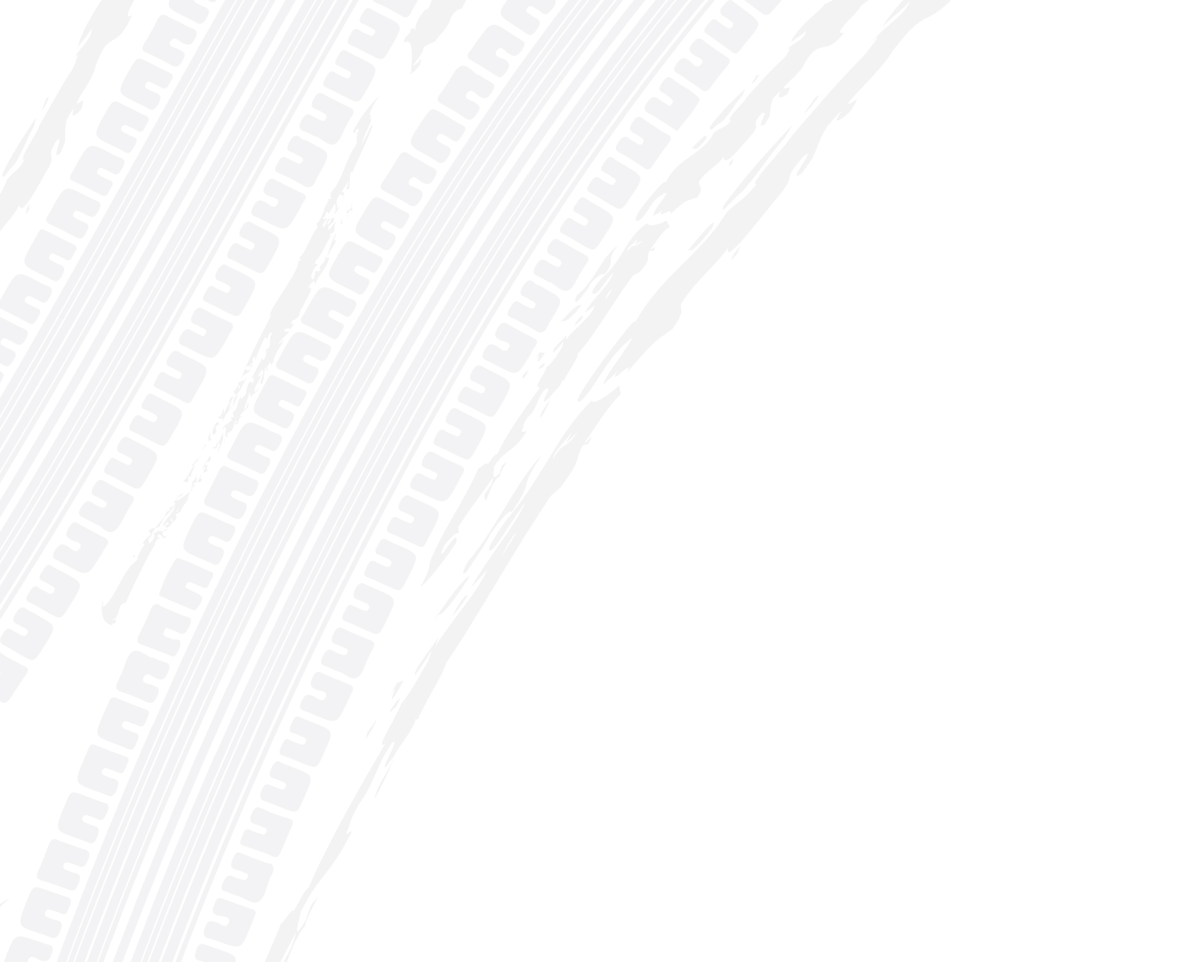 Two white tire tracks diagonally across a white background. | Doran-King Garage Inc