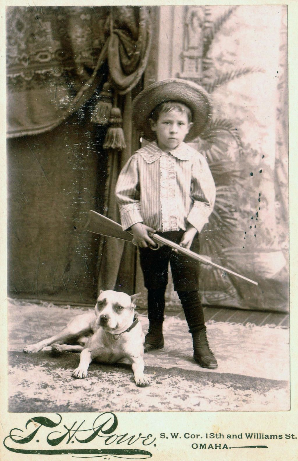 vintage portrait boy with pit bull
