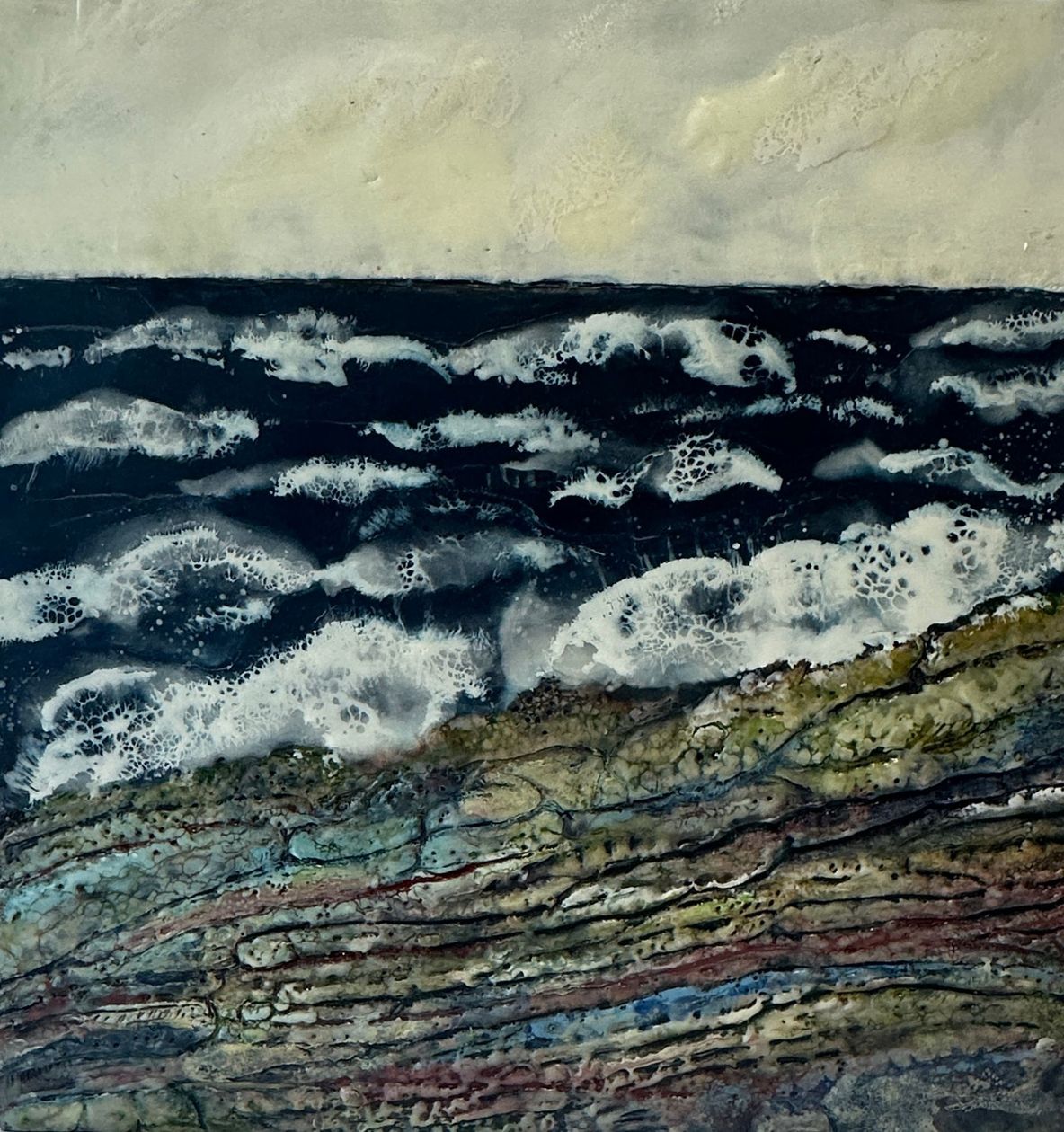 A painting of waves crashing on a rocky shore