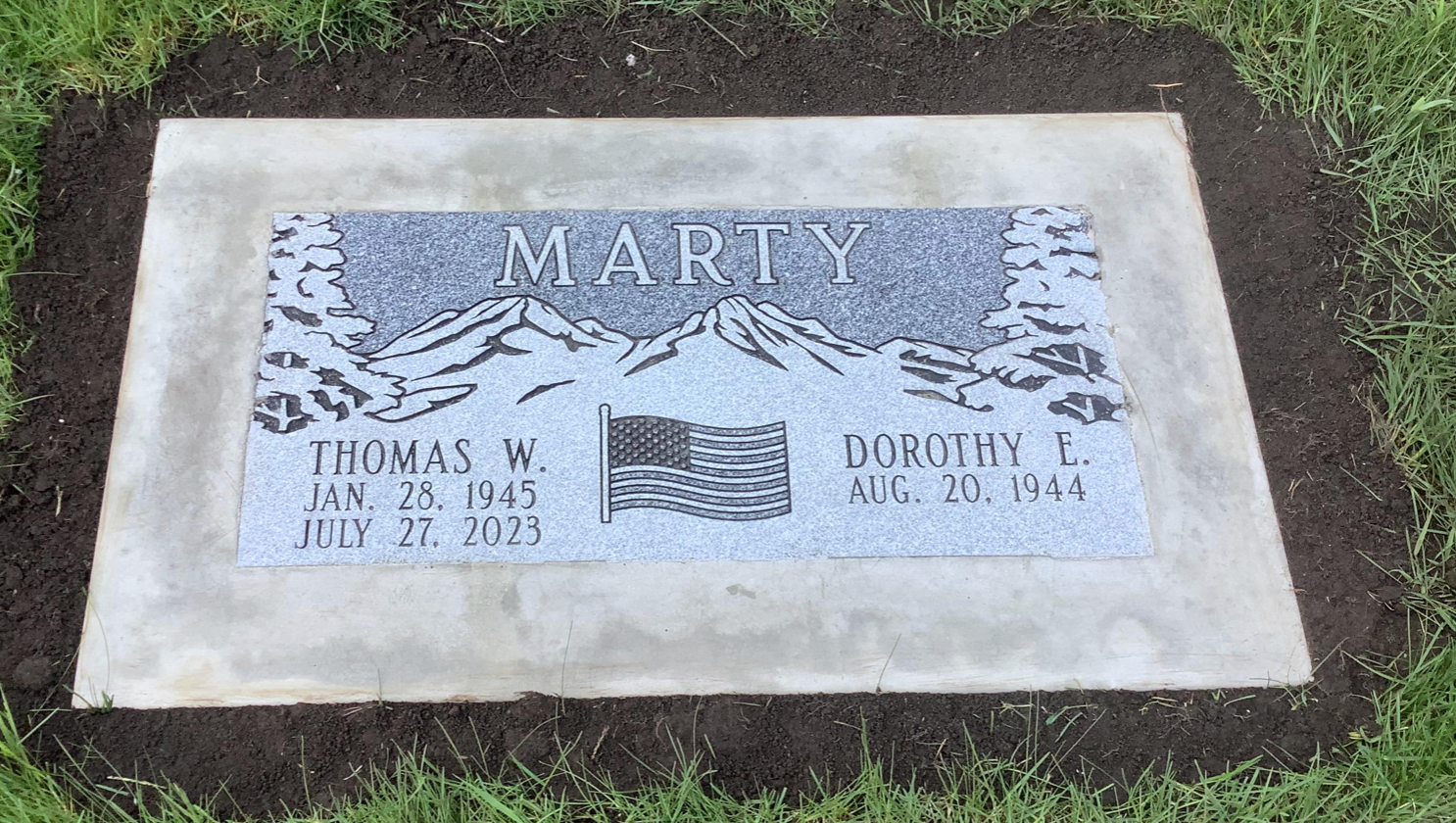 A gravestone with the name marty on it