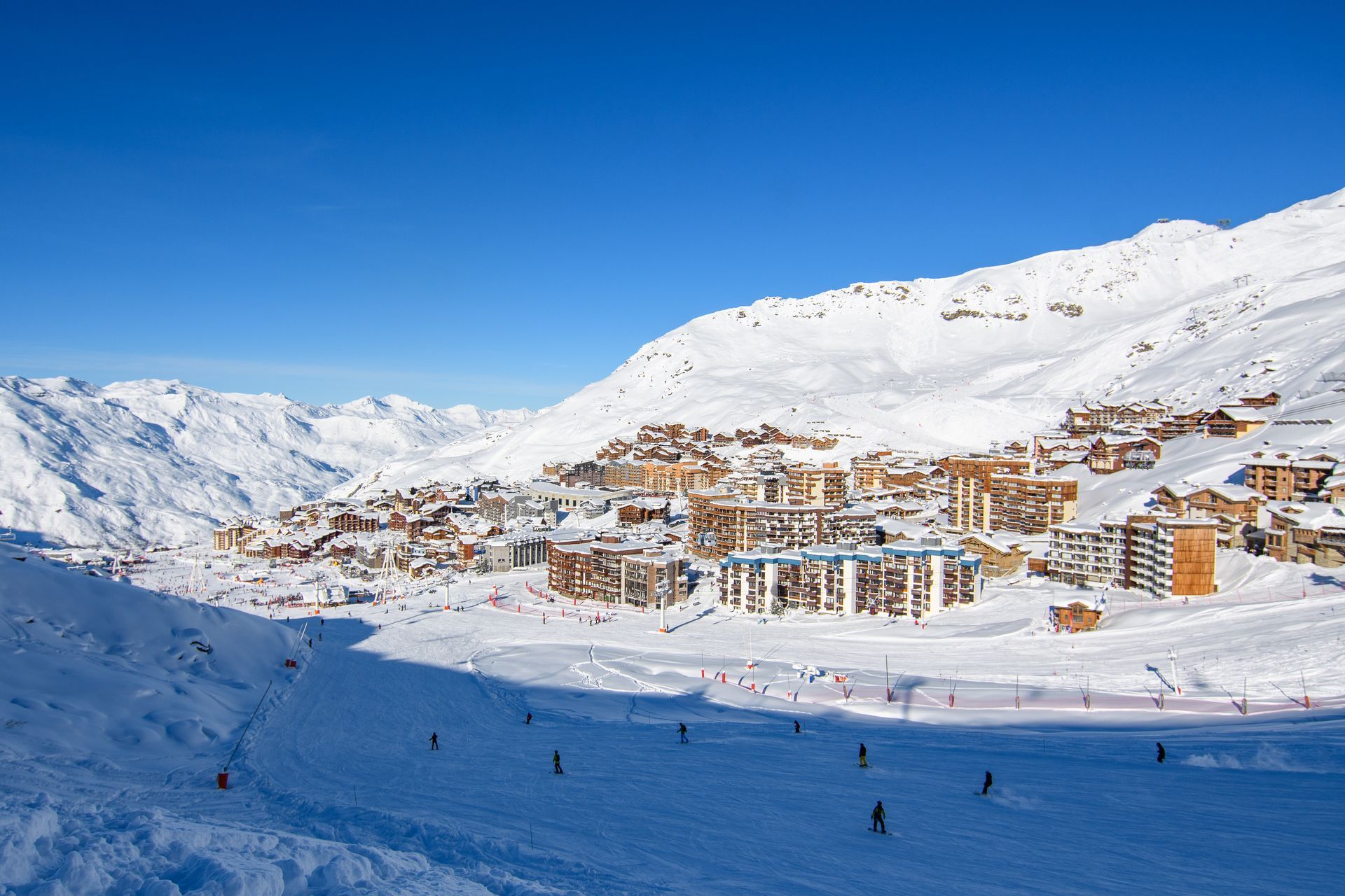A wide shot showing Val Thorens ski resort from one of the pistes above it