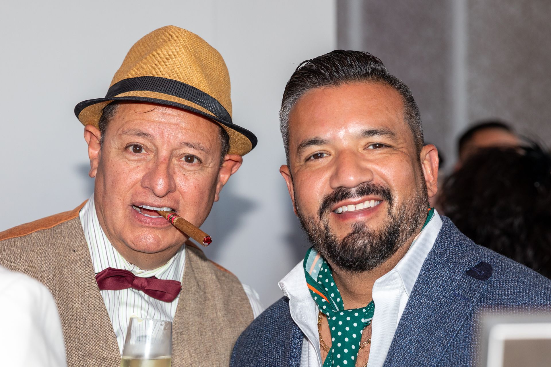 Two men posing for the camera, dressed in period clothing