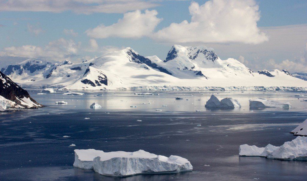 A large body of water with mountains in the background in Antarctica