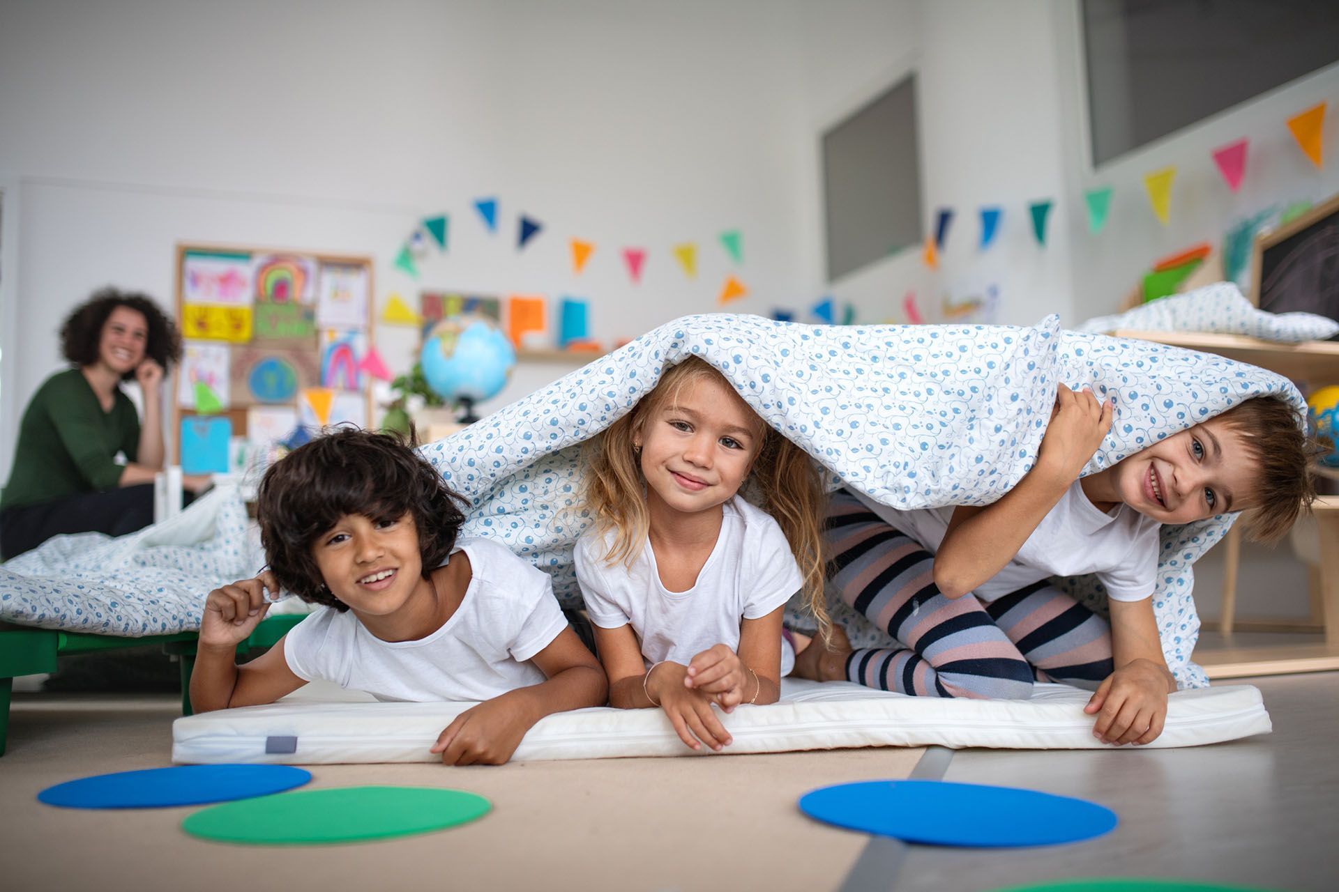 Pre-school children in pajamas having fun — Ames, IA — Ames Community Preschool Center (ACPC)