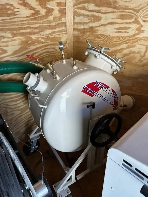 A white container with the word pesticide on it