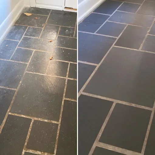 Before and after comparison of dark stone floor tiles, showing a dirty, dusty surface cleaned to a smooth, matte finish.