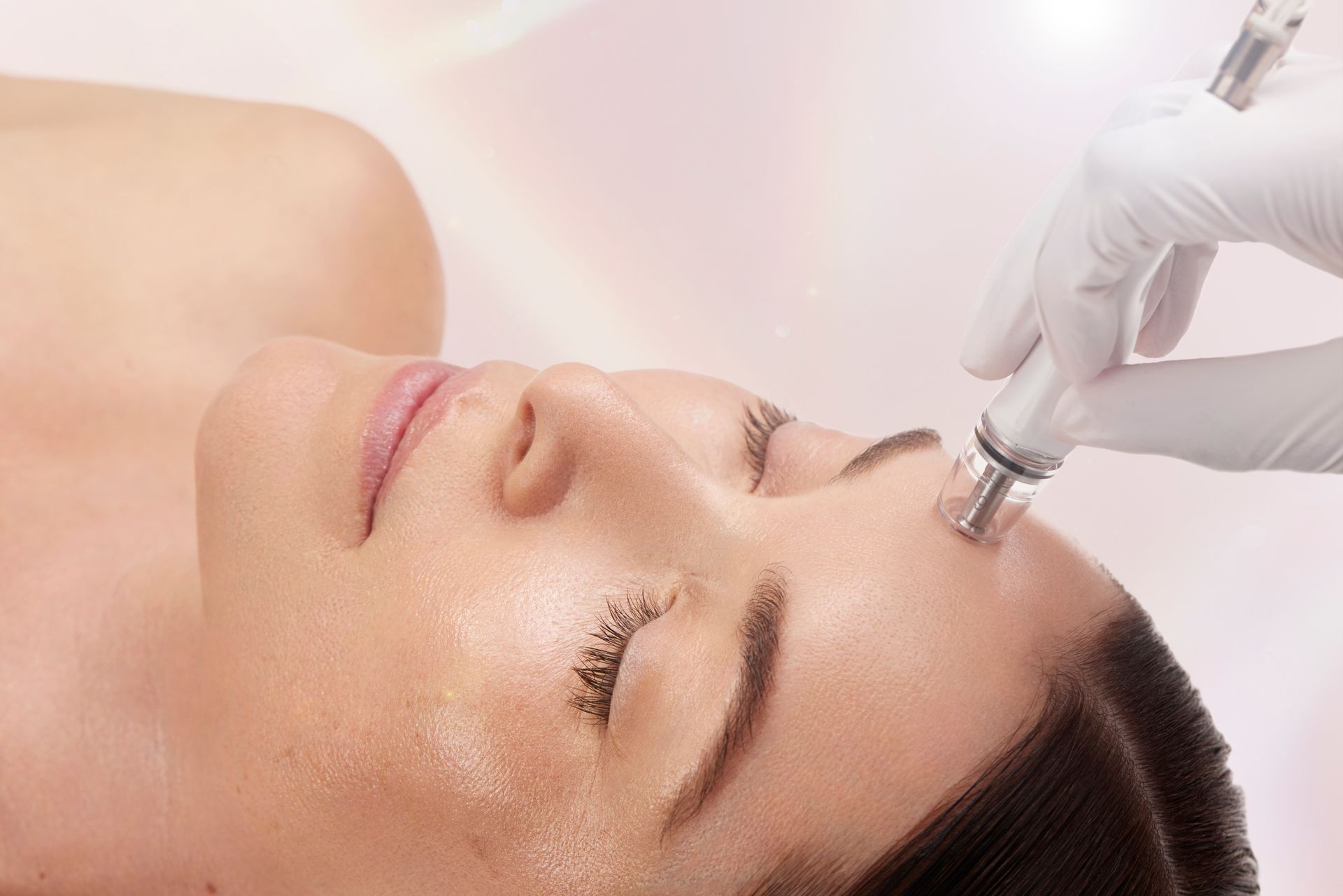 A man is getting a facial treatment at a spa.