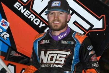 Tyler Courtney and nos energy drink jacket and hat