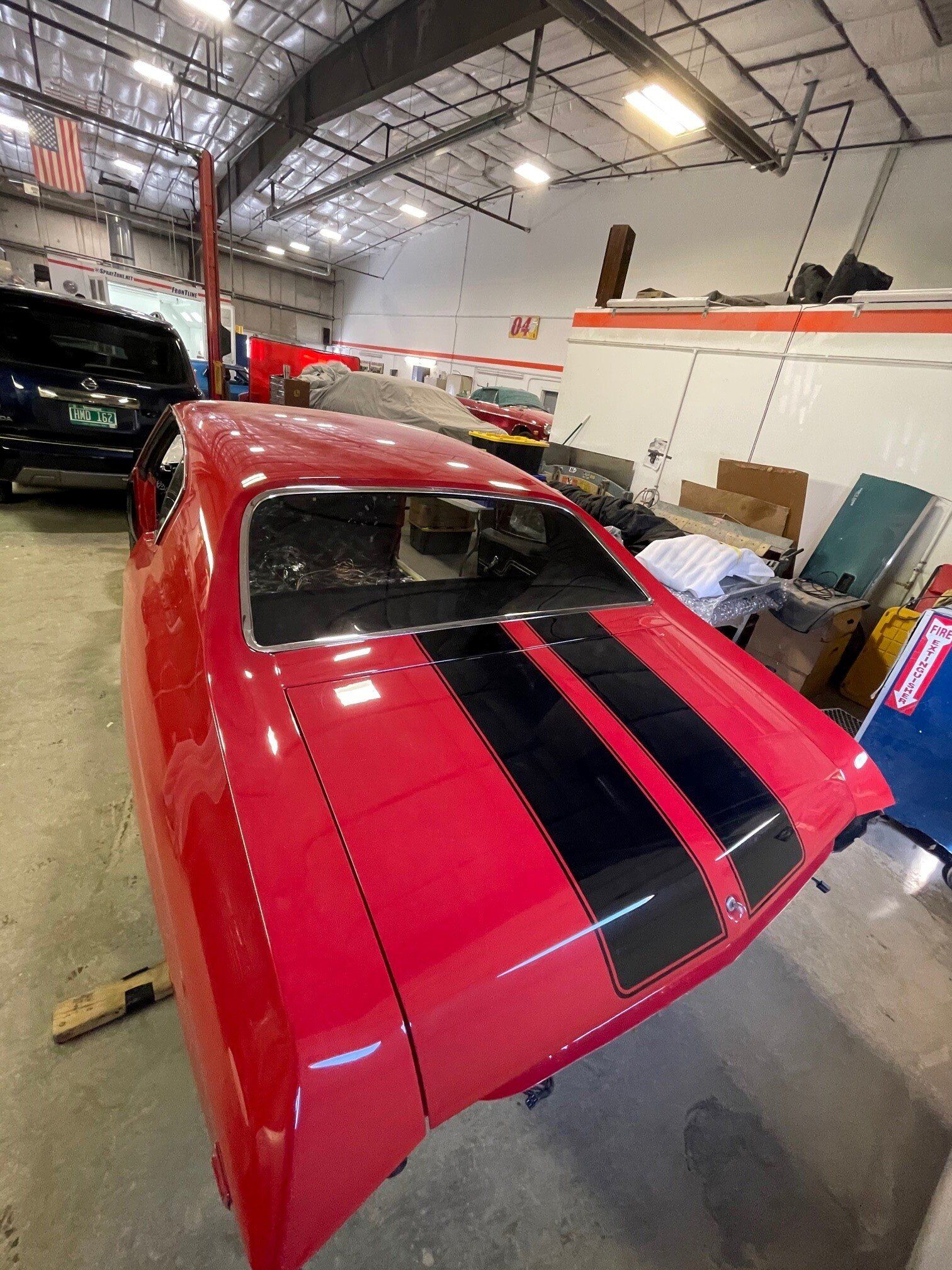Red Sports Car – Ray Lasnier’s Classics and Collision – Essex, VT