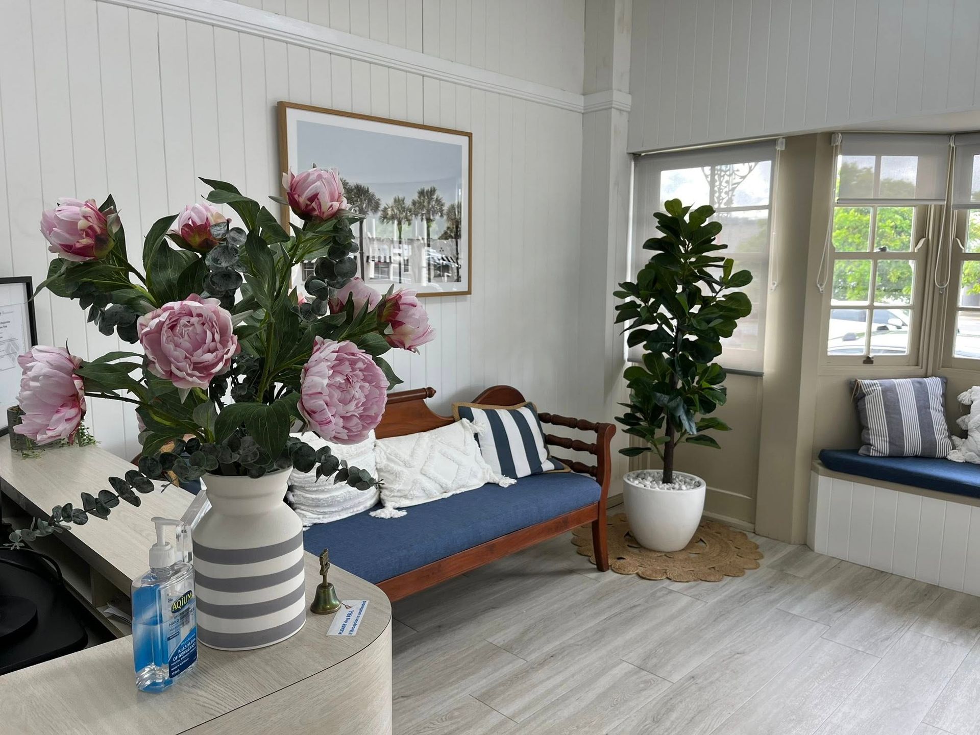 Office area with Blue Coach and Pink Flowers — Pollock Ingram Solicitors in Caloundra, QLD
