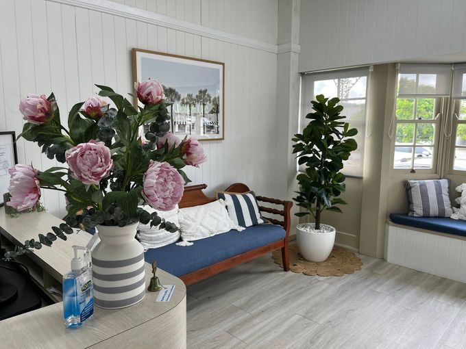 Office area with Blue Coach and Pink Flowers — Pollock Ingram Solicitors in Caloundra, QLD