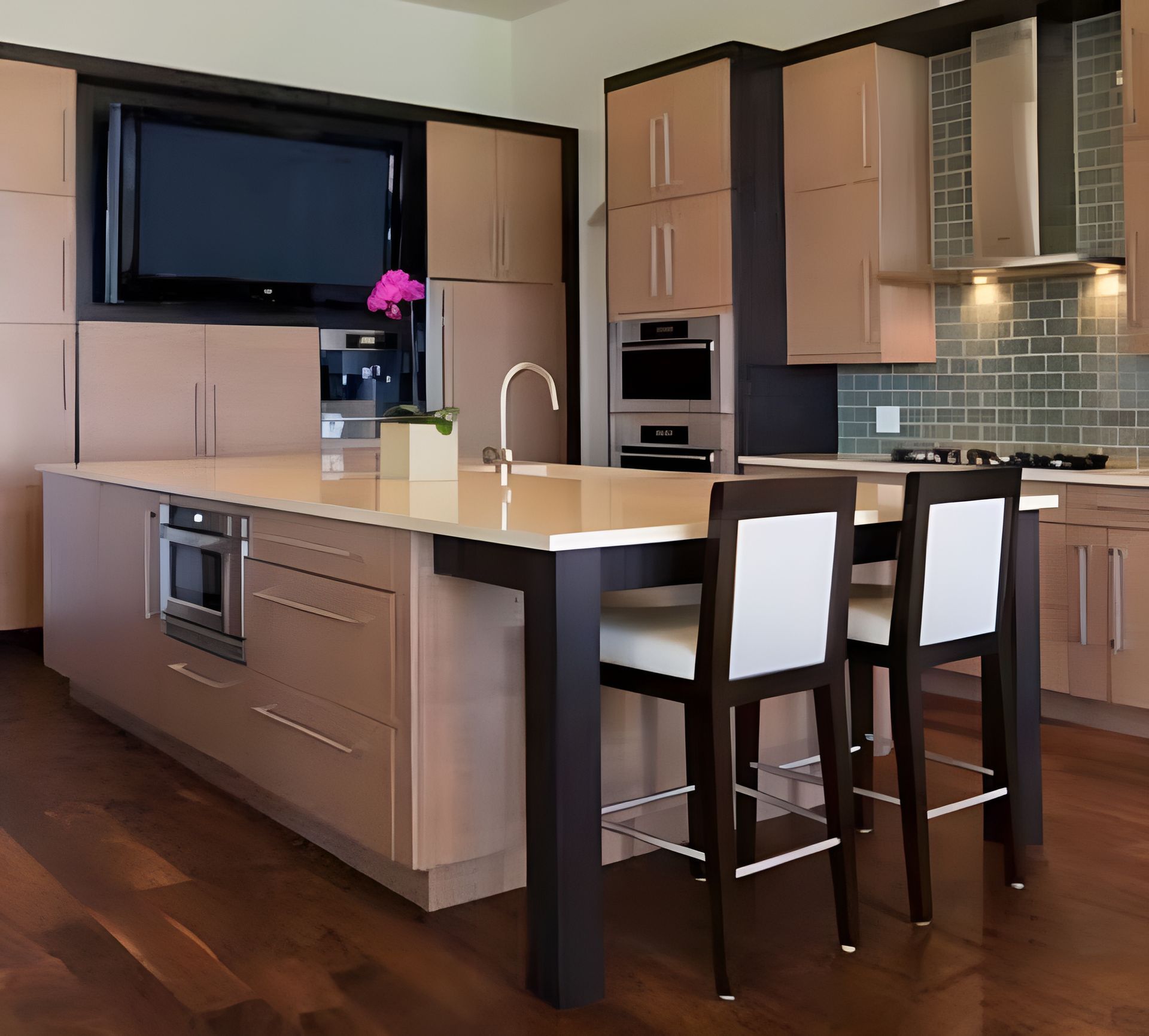 A Kitchen With a Large Island and Two Chairs — Moore Than Just Kitchens In Gunnedah, NSW