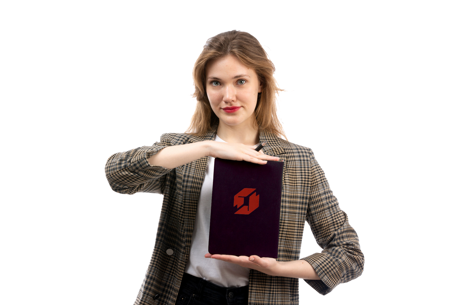 A woman in a plaid jacket is holding a book in her hands.