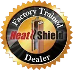 The logo for a factory trained heat shield dealer.