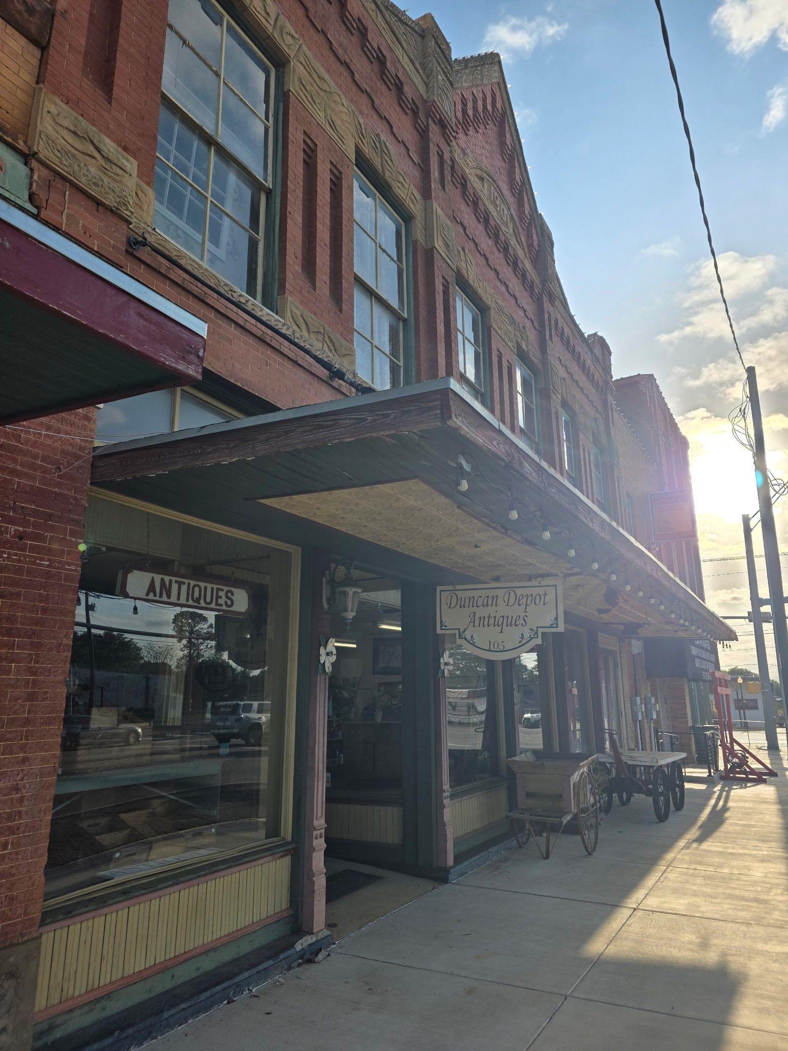 The sun is shining through the windows of a brick building. A place worked by remodeling contractors.