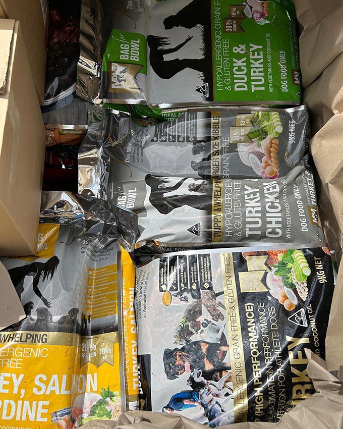 A Box Filled With a Variety of Pet Food — Howard Landscape and Produce Supplies in Howard, QLD