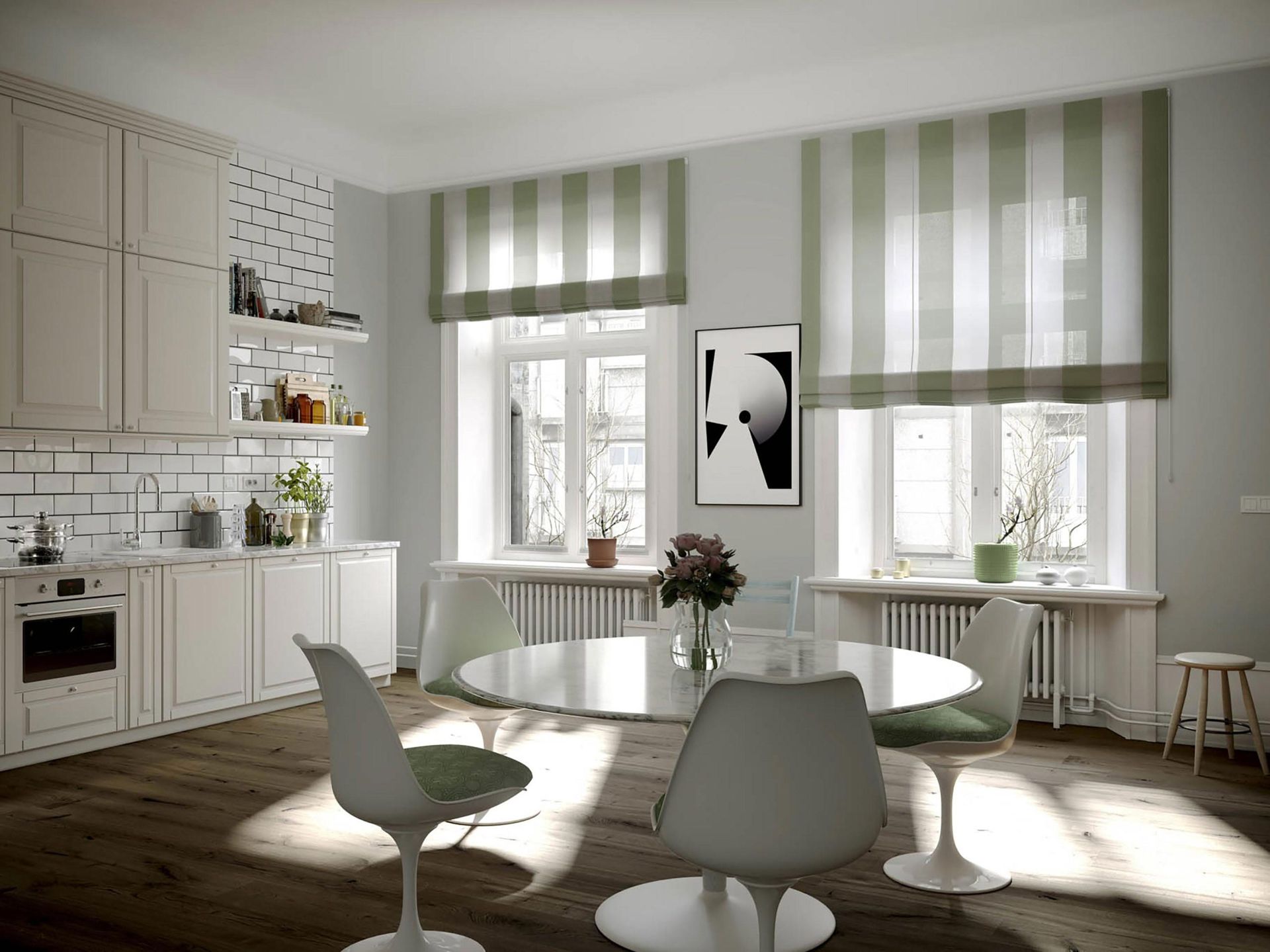 Una cucina con un tavolo rotondo e delle sedie