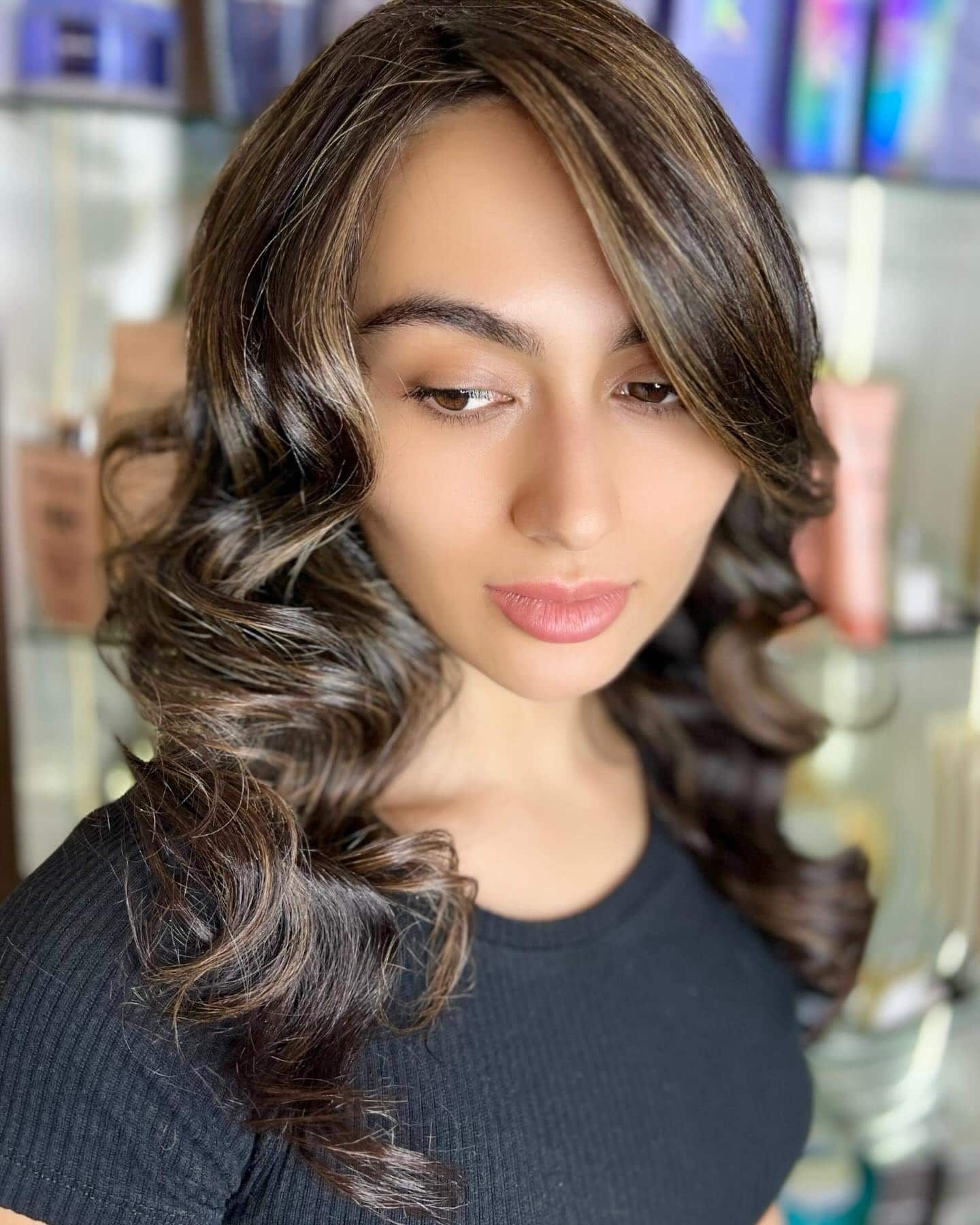 Woman With Brown Hair, Styled in Curls, With Highlights, Looking Down — Studio 23 In Biggera Waters, QLD