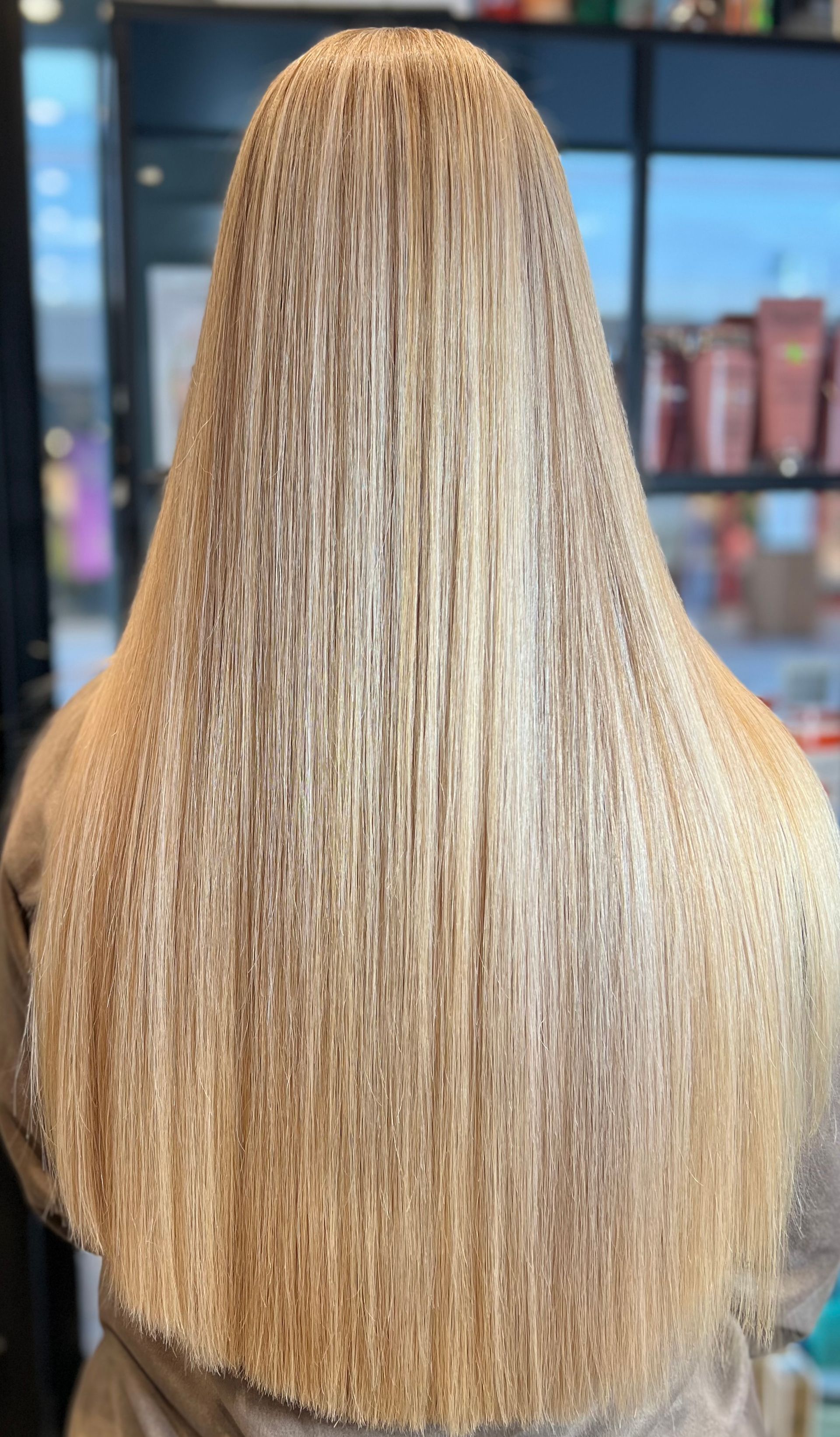 Woman With Long, Straight, Layered Blonde Hair in a Salon — Studio 23 In Biggera Waters, QLD