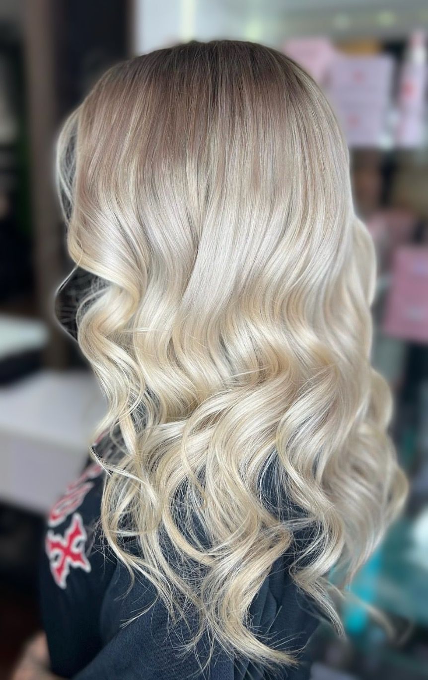 Blonde ombre wavy hair, dark roots fading to light blonde — Studio 23 In Biggera Waters, QLD