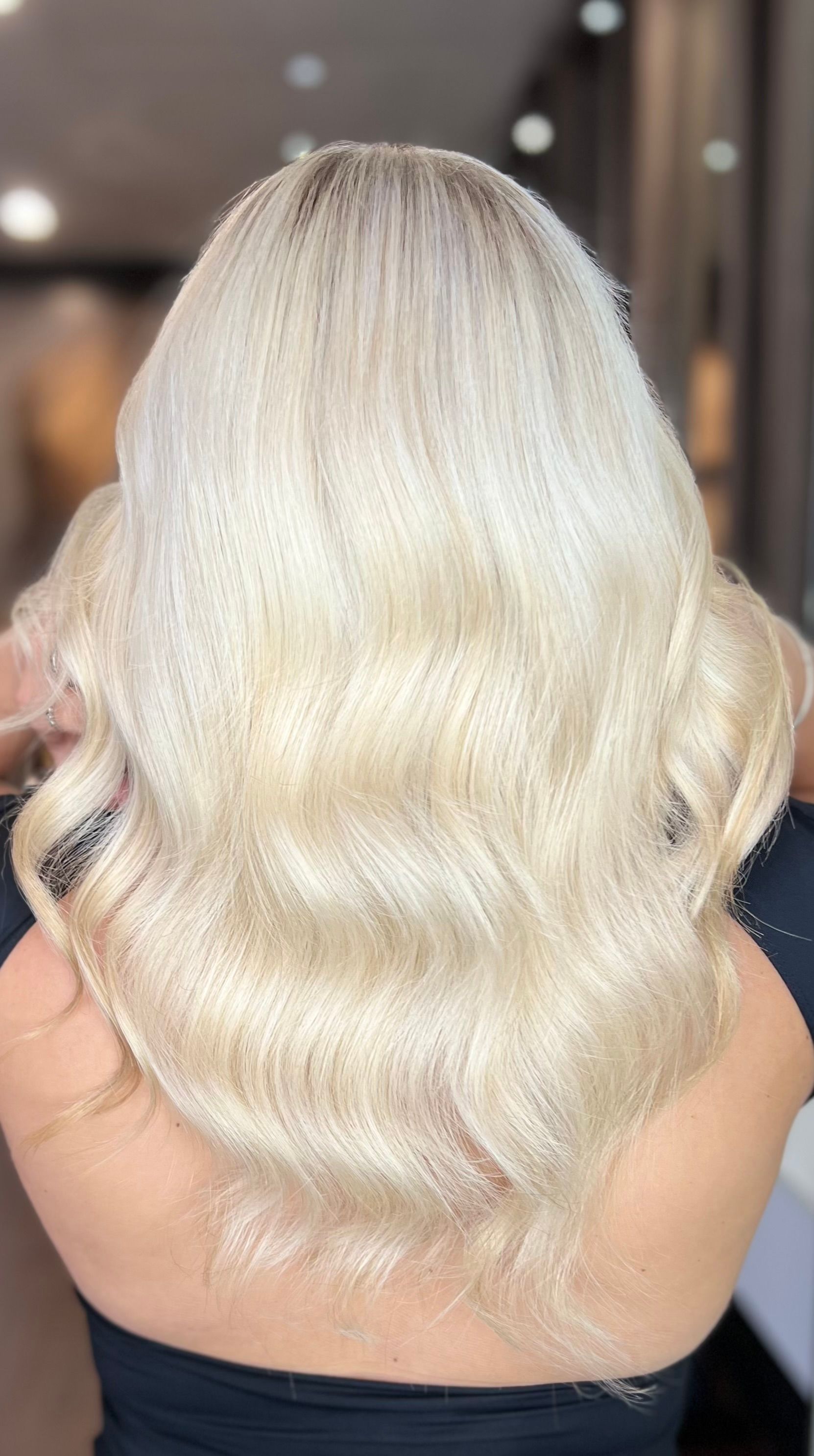 Blonde Woman With Wavy Hair in a Salon, Side View — Studio 23 In Biggera Waters, QLD