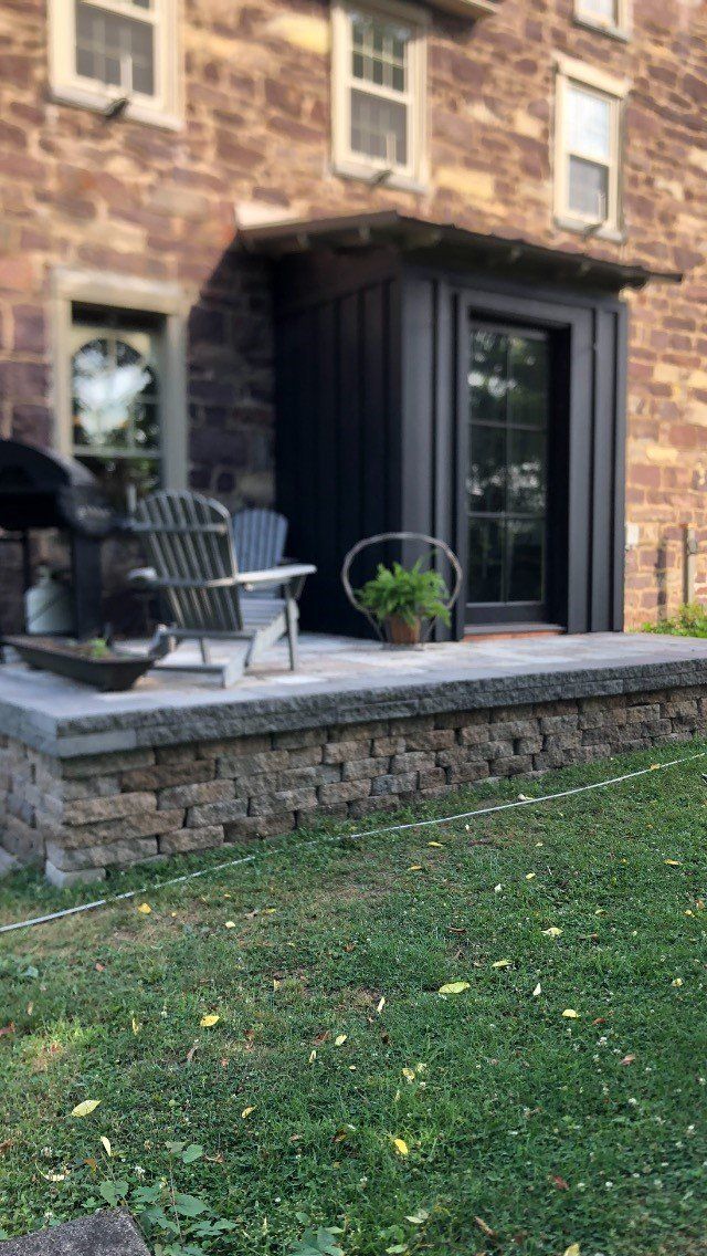 Front of House with Chair — Coopersburg, PA — Fine Finishes