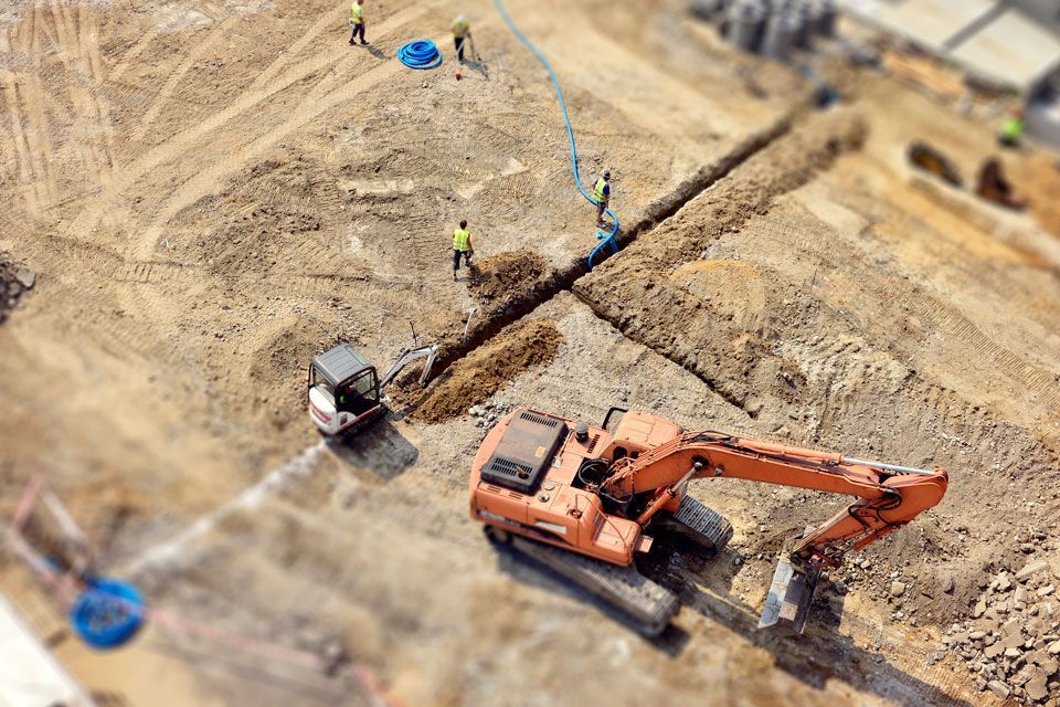 An Aerial View of a Construction Site With a Bulldozer and Workers | Round Lake, IL | Korinek & Son Concrete and Asphalt