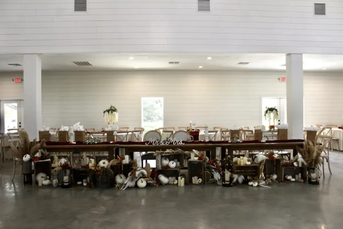 There is a long table in the middle of the room.