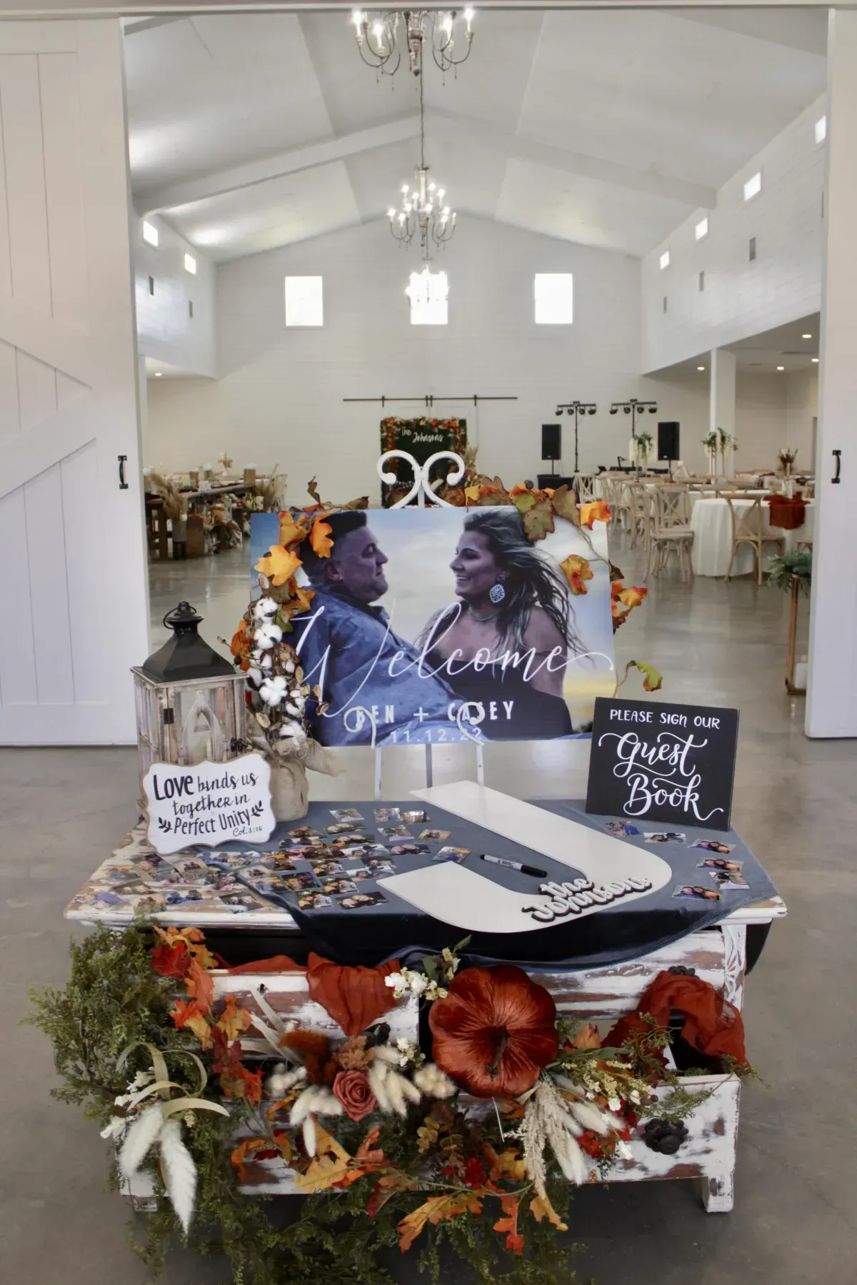 A table with a picture of a bride and groom on it.