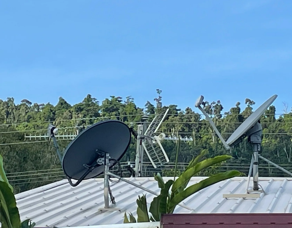 Two Satellite Dishes on a Rooftop — Apex Antenna Solutions Pty Ltd in Airlie Beach, QLD