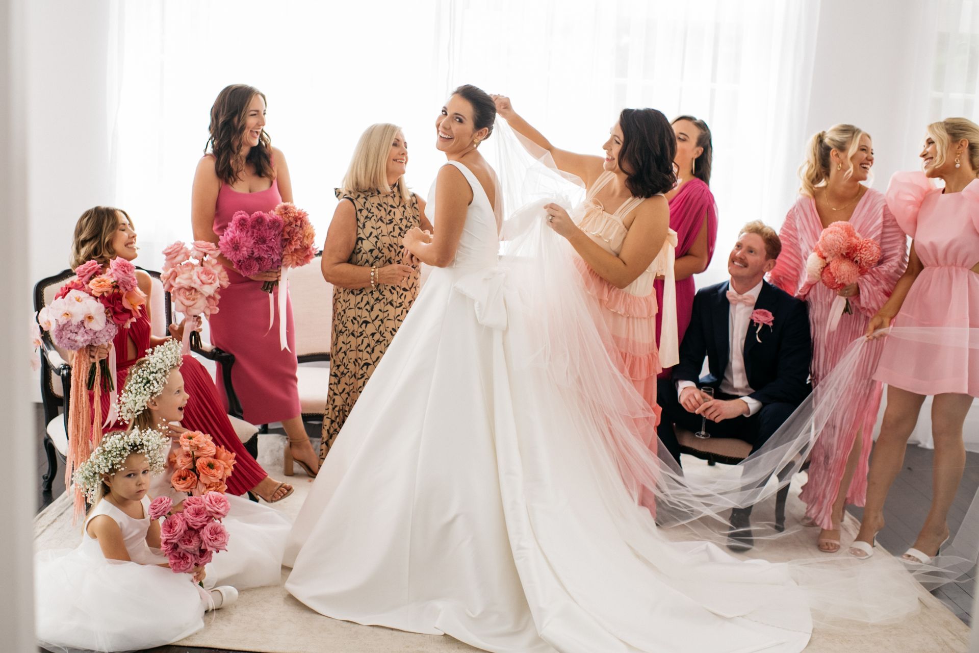 bride and her bridal group after having their hair and makeup done