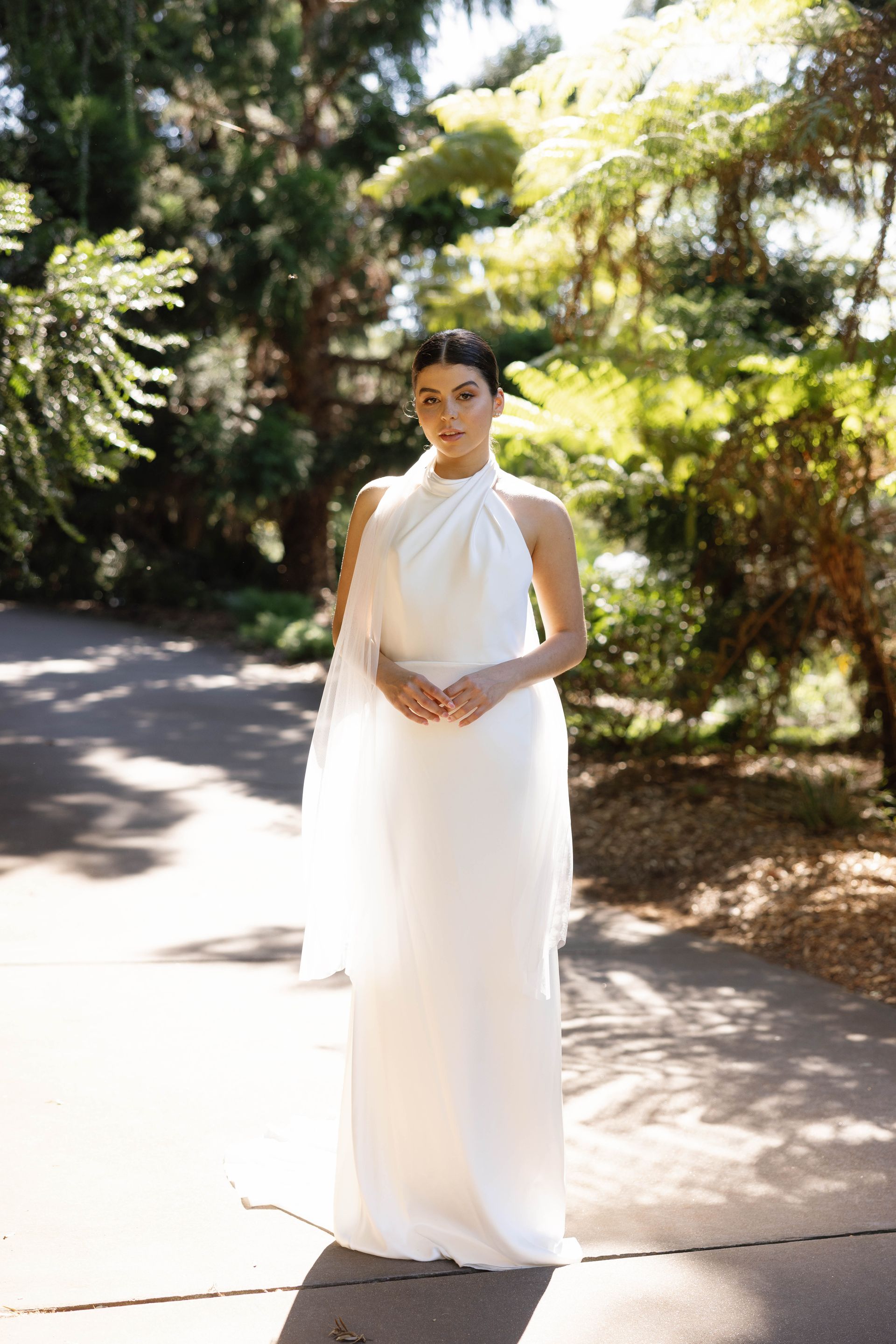 stunning bride on her wedding day with gorgeous hair and makeup