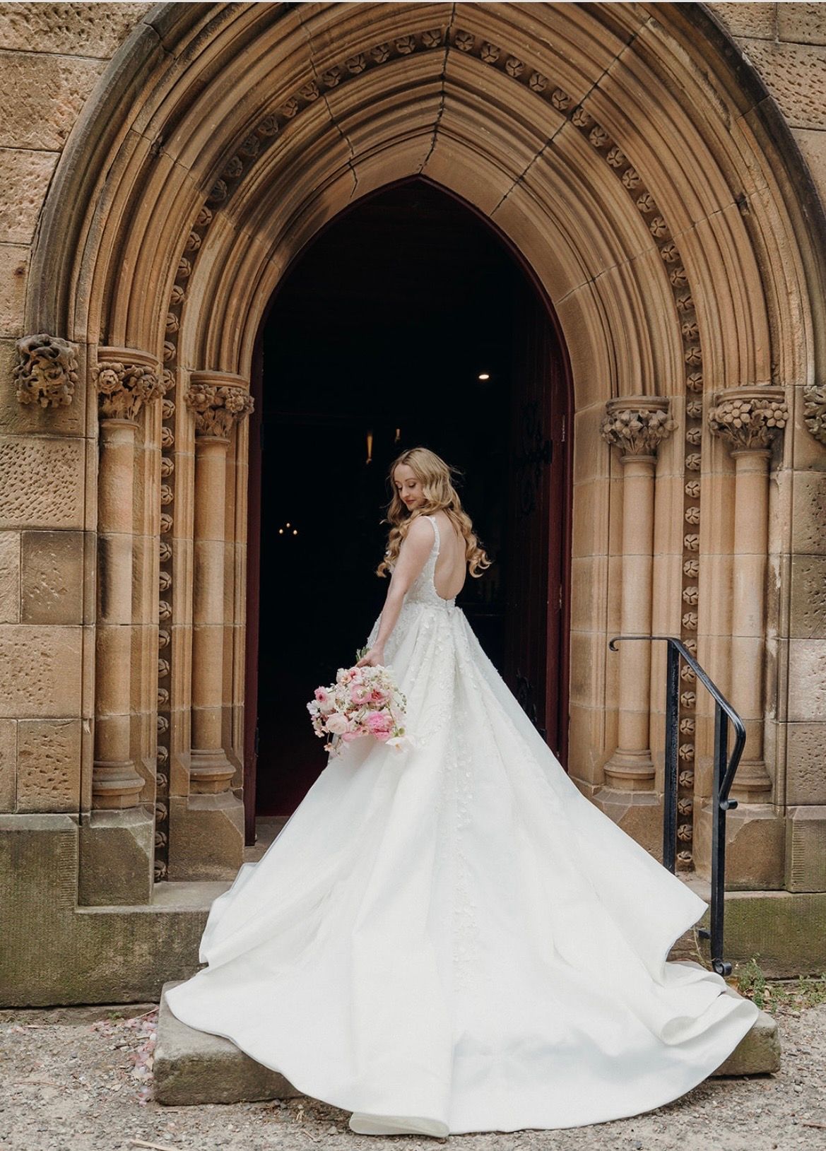 bride at the church with stunning hair and makeup