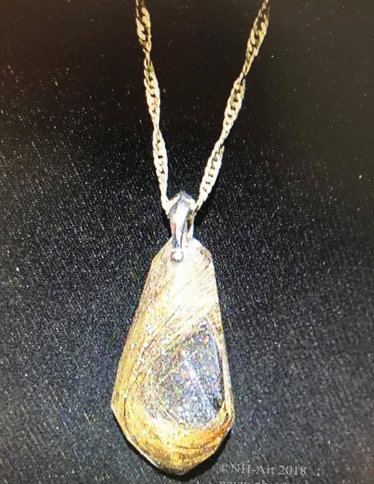 ciondolo con pelo animale