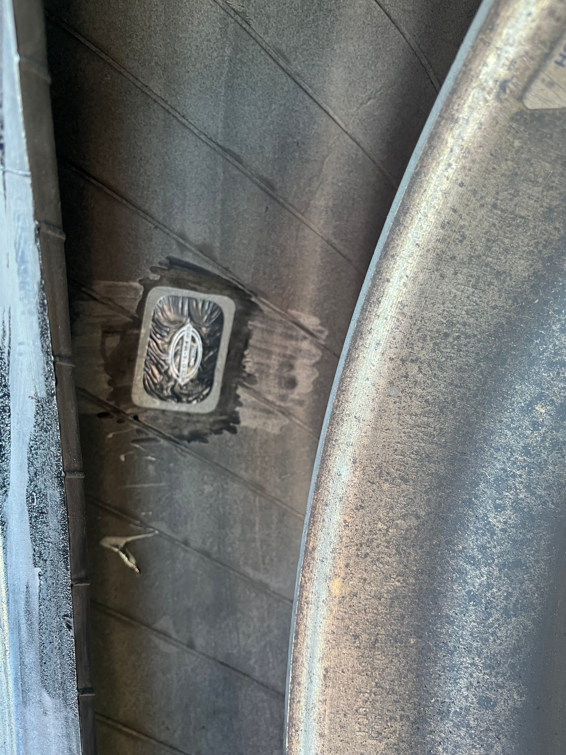 A close up of a tire with a hole in it