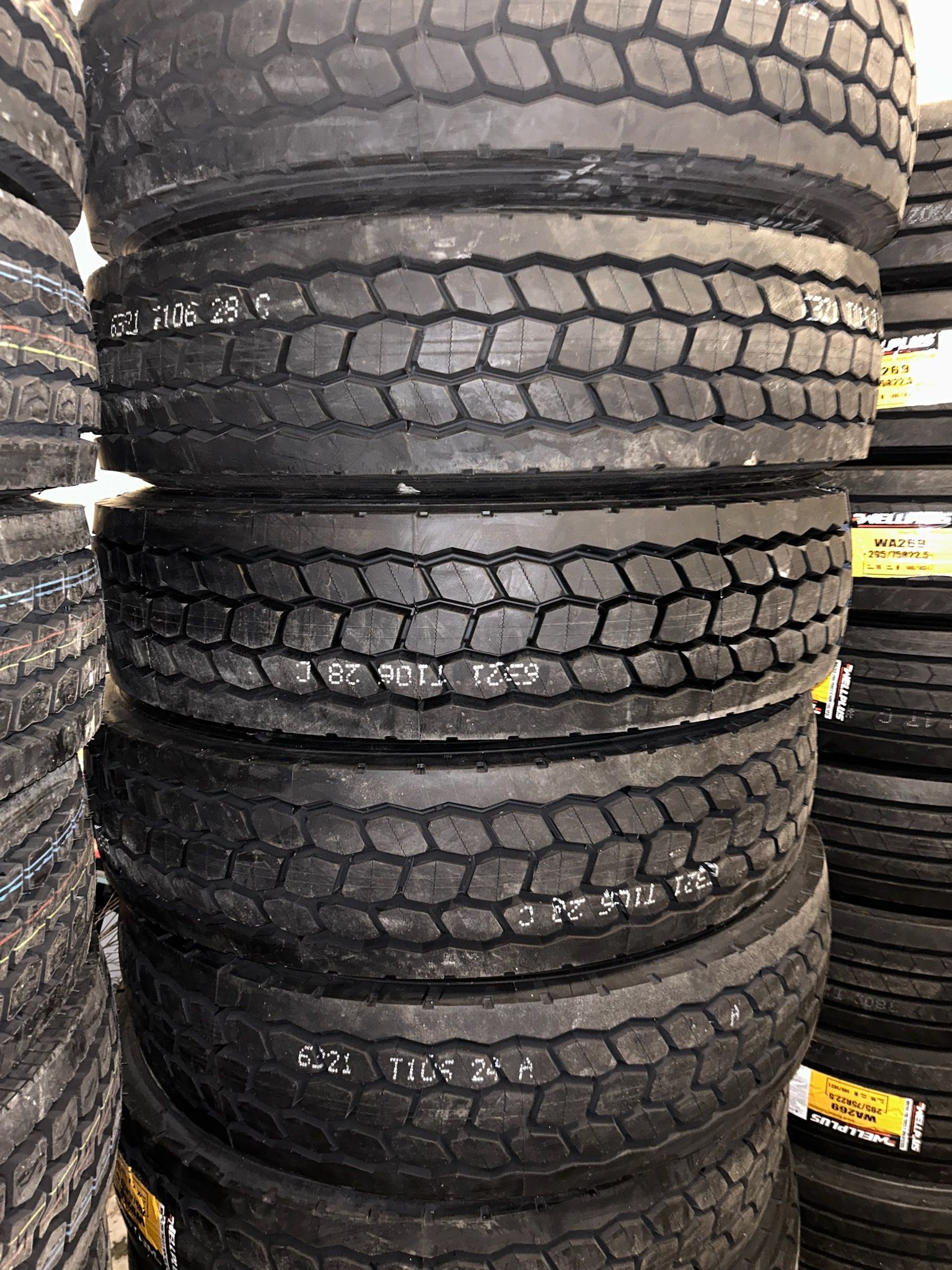 A pile of tires stacked on top of each other.