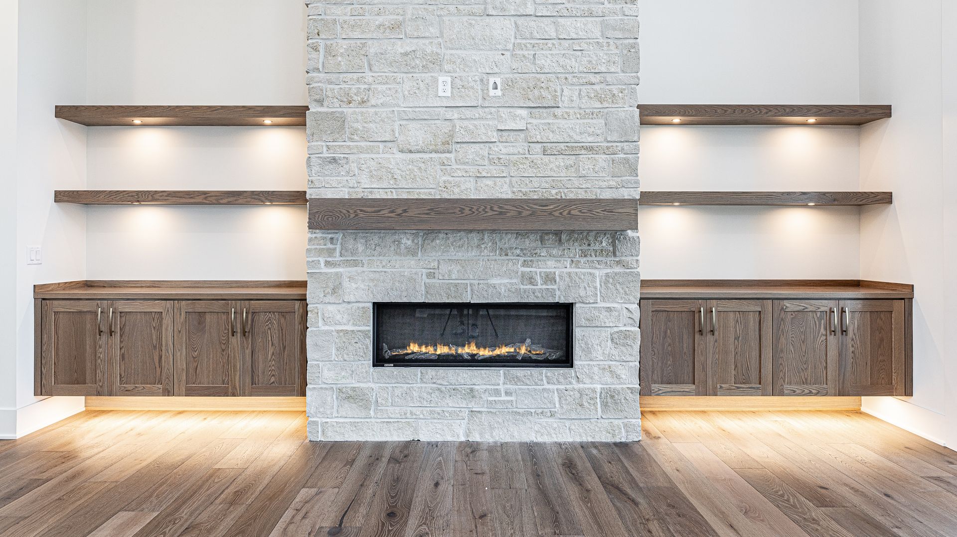 There is a fireplace in the middle of the room.